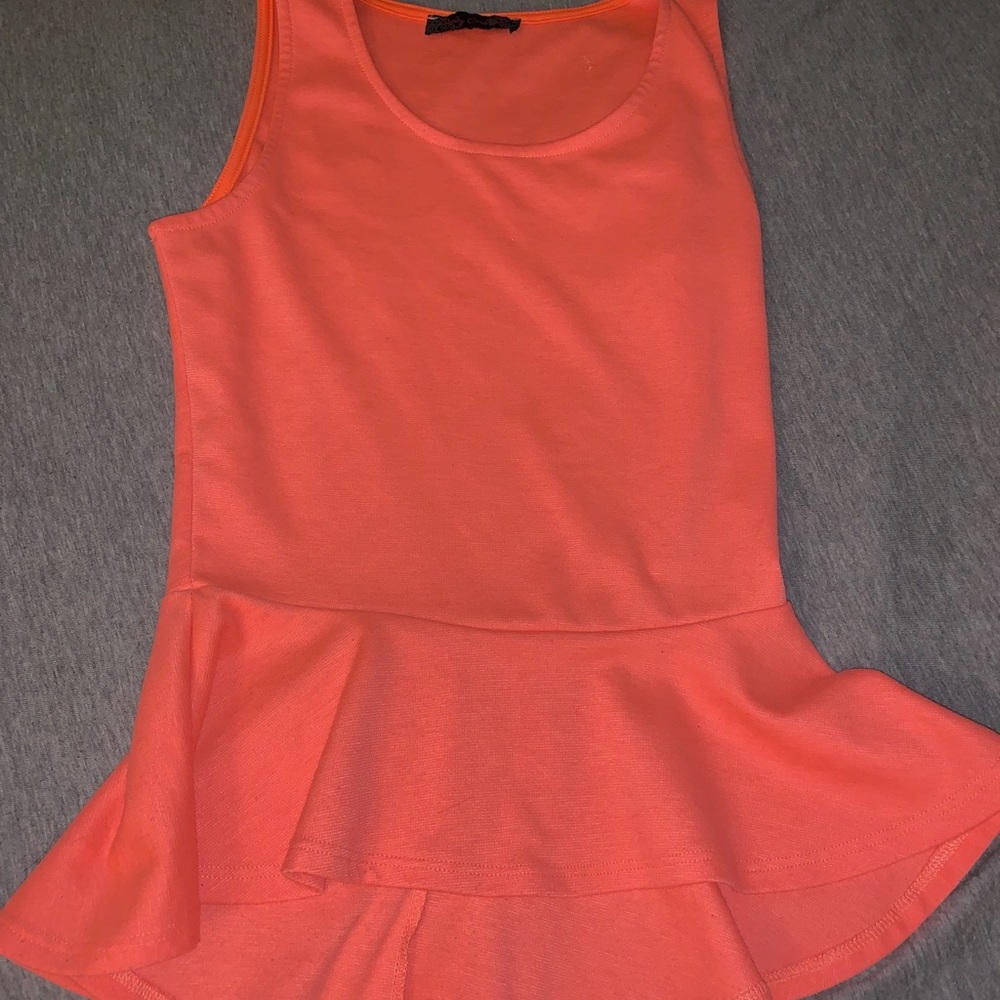Women’s neon pink peplum tank top